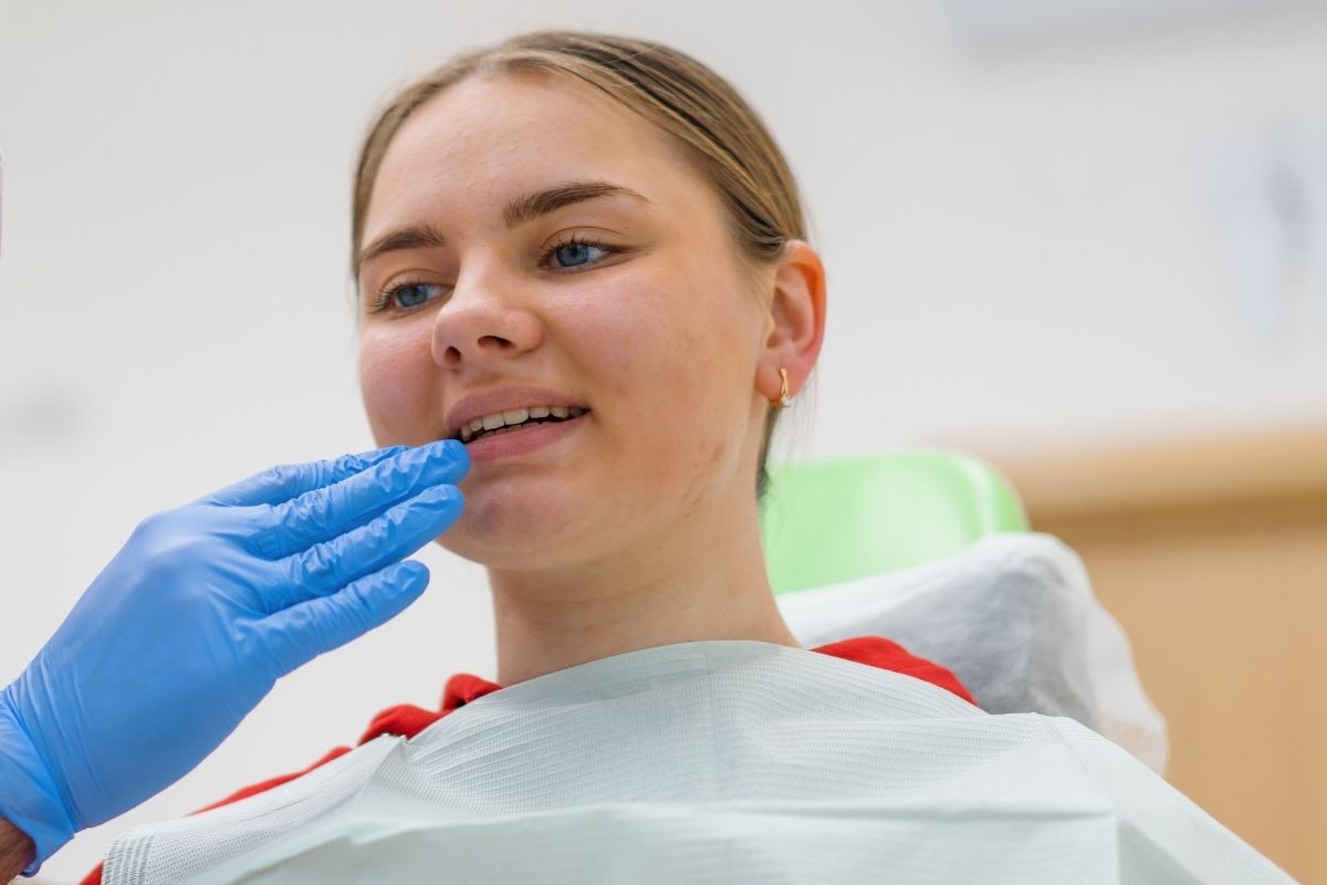 Girl Getting Teeth checked at dental office