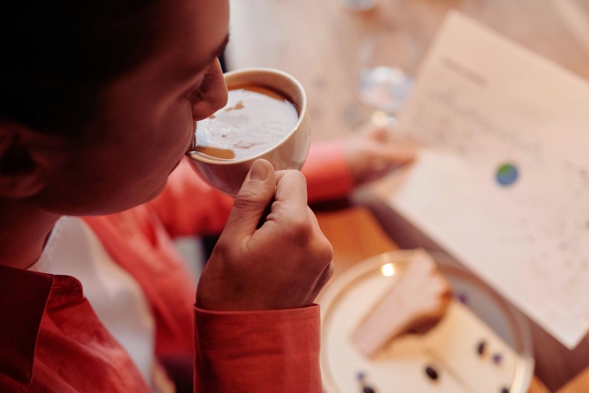 women enjoying cup of coffee women enjoying cup of coffee